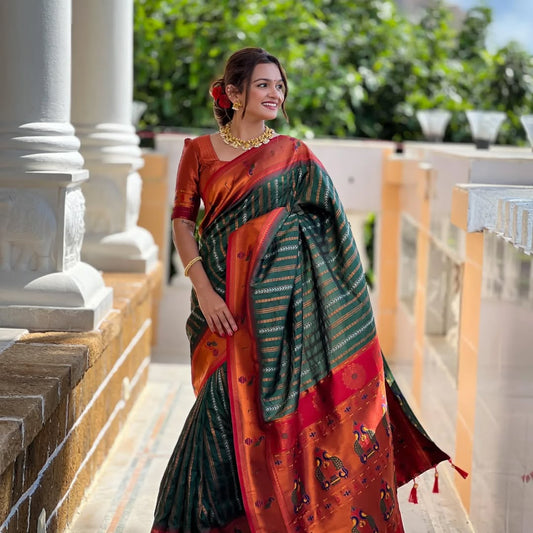 Adorned with beautiful Zari work Saree From Soti Designer